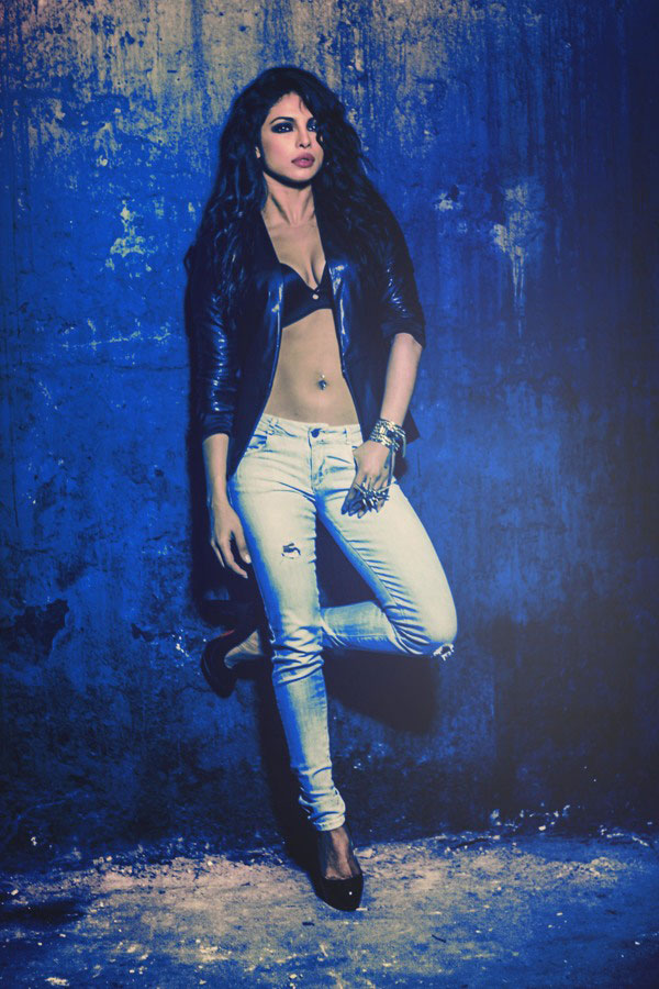 Priyanka Chopra in white jeans and black leather jacket