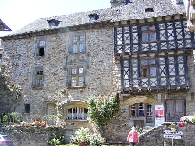 On the left, La Maison Henri IV, on the right La Maison Boyer, Ségur le Chateau, Correze, France. Photo by Loire Valley Time Travel..
