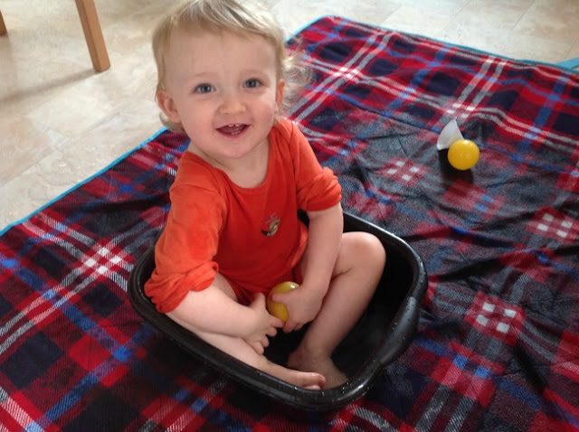 My Sunday Photo. Toddler sat in washing up bowl full of water