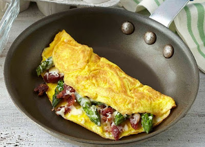 Omelette is my favorite dish that's delicious and easy to make. so today i want share you how to make omelet in a cast-iron skillet. but simple tips to you when cooking an omelet in cast iron you must control the temperature to prevent sticking.  Ingredients Onion Mushrooms Asparagus 2 eggs