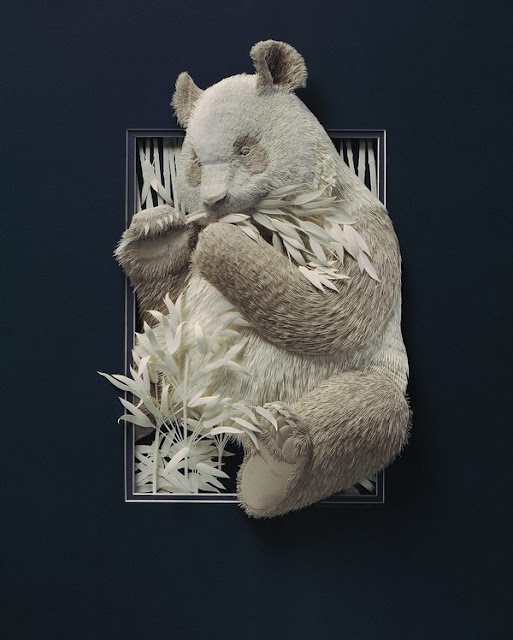 intricate wildlife paper sculpture 