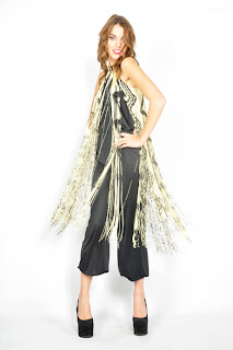 Vintage 1970's disco black and white swingy fringe halter jumpsuit.