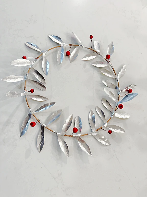 metal wreath with berries