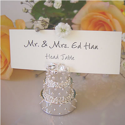 Unique wedding favors like place card holders add style and polish to the 