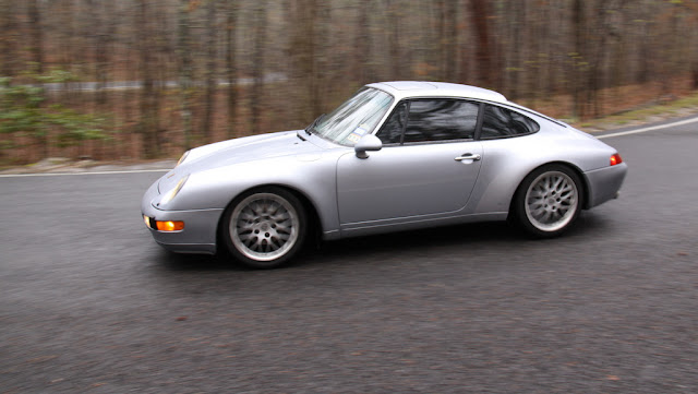 Silver Porsche 993 on Hot Springs Mountain Road Arkansas road trip