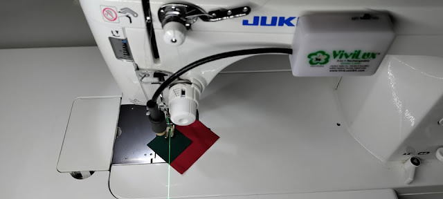 Sewing machine laser