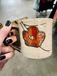 Vintage mug with a flower