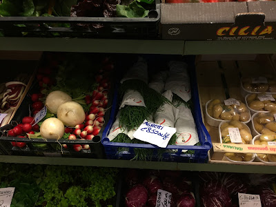 Agretti in the fruttivendolo on via Masone in Bergamo.