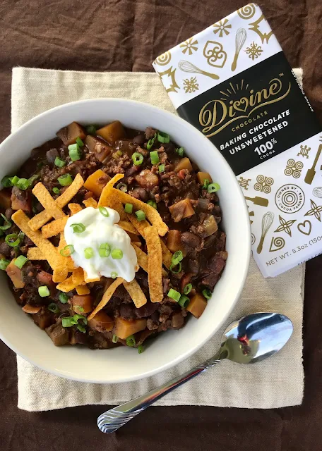 Bowl of beef and butternut squash chocolate chili.