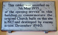 The stone tablet that marks the opening of the present building in 1955