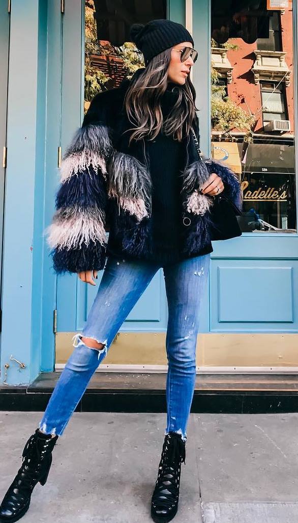 winter outfit idea / hat + bag + sweater + fur jacket + ripped jeans + boots