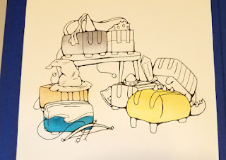 The first round of watercolor paint on a drawing of seven toasters.