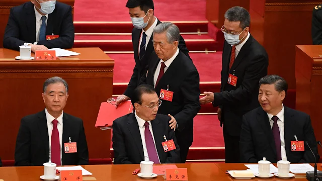 Cover Image Attribute: Former president Hu Jintao leaves the closing ceremony of the 20th Chinese Communist Party's Congress / Source: AFP