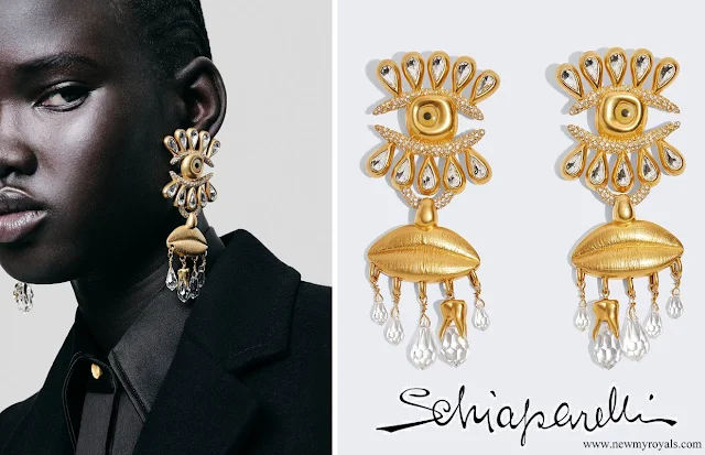 Princess Rajwa wore Schiaparelli Mouth and Eye Gold Brass Pendant Earrings