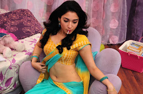 Tamanna Hot Navel Cleavage Show with Lollypop Pictures