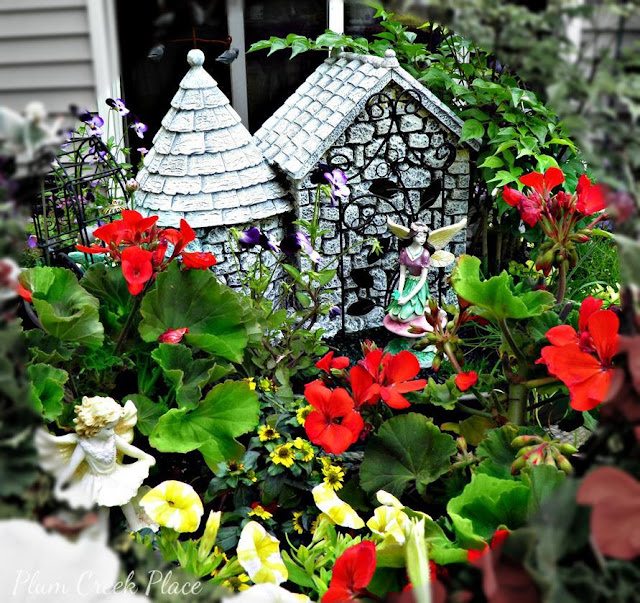 Fairy Garden 2015 made from thrift store finds.