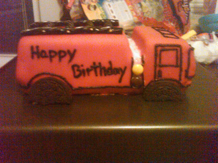 He's a firefighter so she made the cutest little firetruck out of cake.