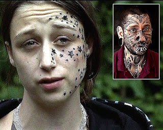 Women tattoos star on face 