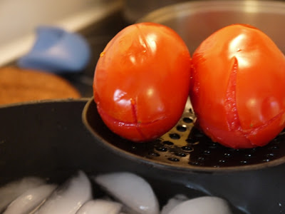 peeling tomatoes