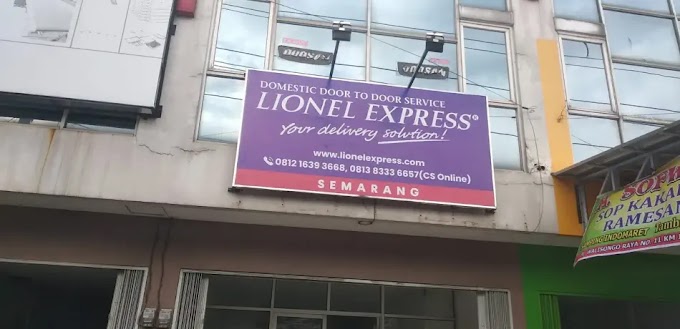 Papan Nama Berlampu Sorot Lionel Express Semarang