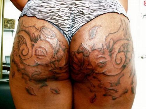 Double cheek butt tattoo