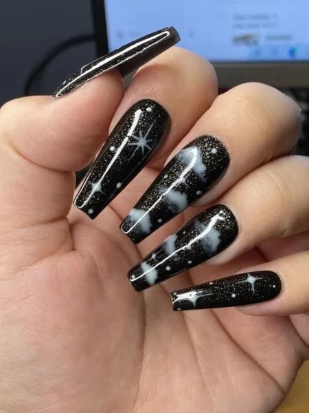 Ballerina nails with a night time sky layout