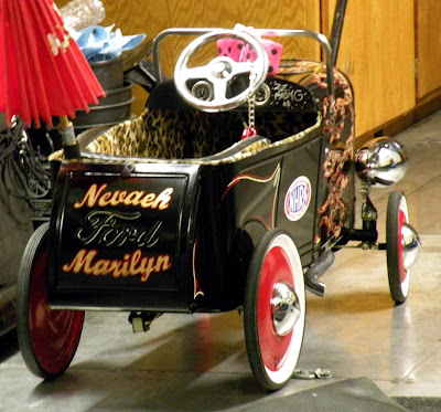 This pedal car is signed by ZZ Top guitarist Billy Gibbons 