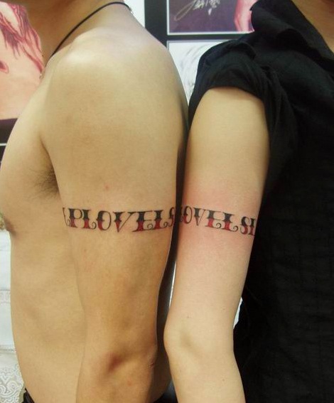 sweet tattoo designs. lovers tattoo design on the
