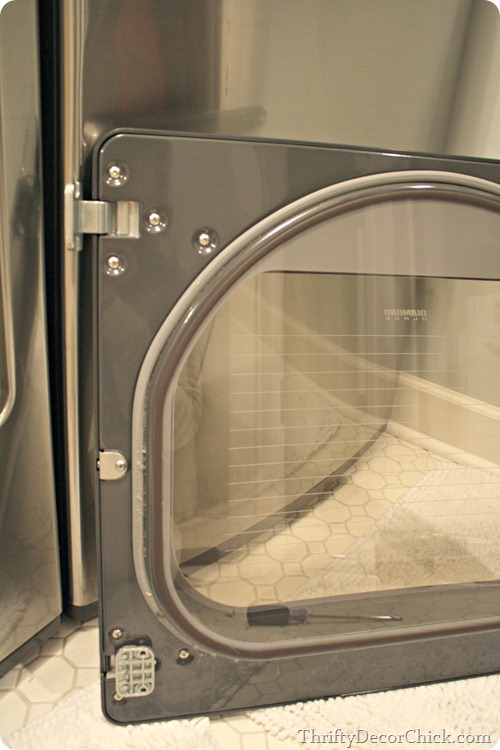 Switching direction of dryer door