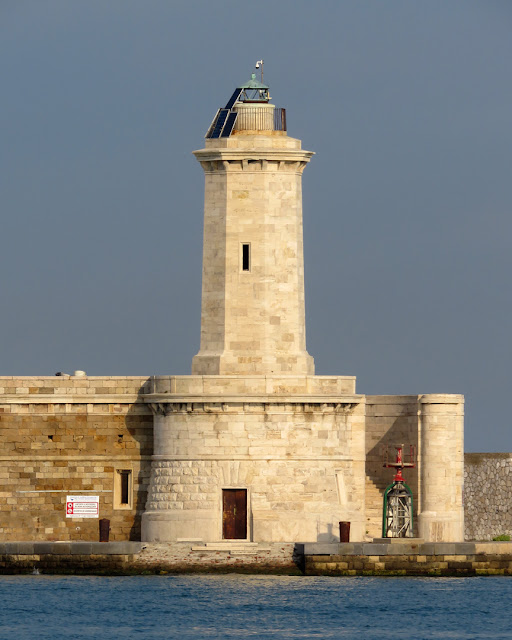 The lighthouse at the north end of the Diga Curvilinea (Curvilinear Breakwater), port of Livorno