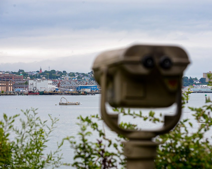 Portland, Maine USA August 2019 photo by Corey Templeton. Keeping an eye on the waterfront and Munjoy Hill, from across the Casco Bay Bridge.