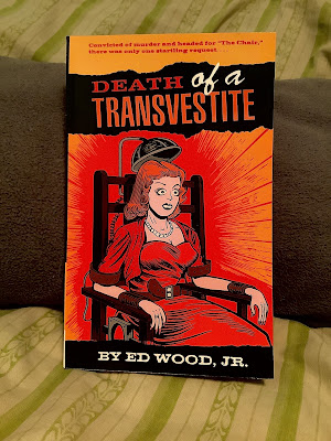 A man dressed as a woman in a red dress sits in the electric chair on the cover of DEATH OF A TRANSVESTITE by Ed Wood, Jr.  With a caption that reads, Convicted of murder and headed for “The Chair,”  there was only one startling  request…