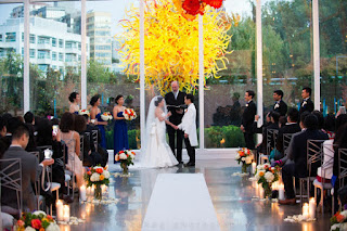 Kent Buttars officiating at he chihuly Garden and Glass Museum for Bonnie and Manson 