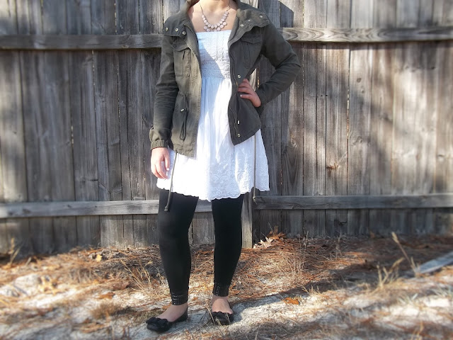 white eyelet dress black leggings military jacket black flats pink necklace outfit trafficking dressember inspiration