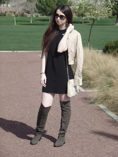 Little black shift dress with boots and a leather jacket