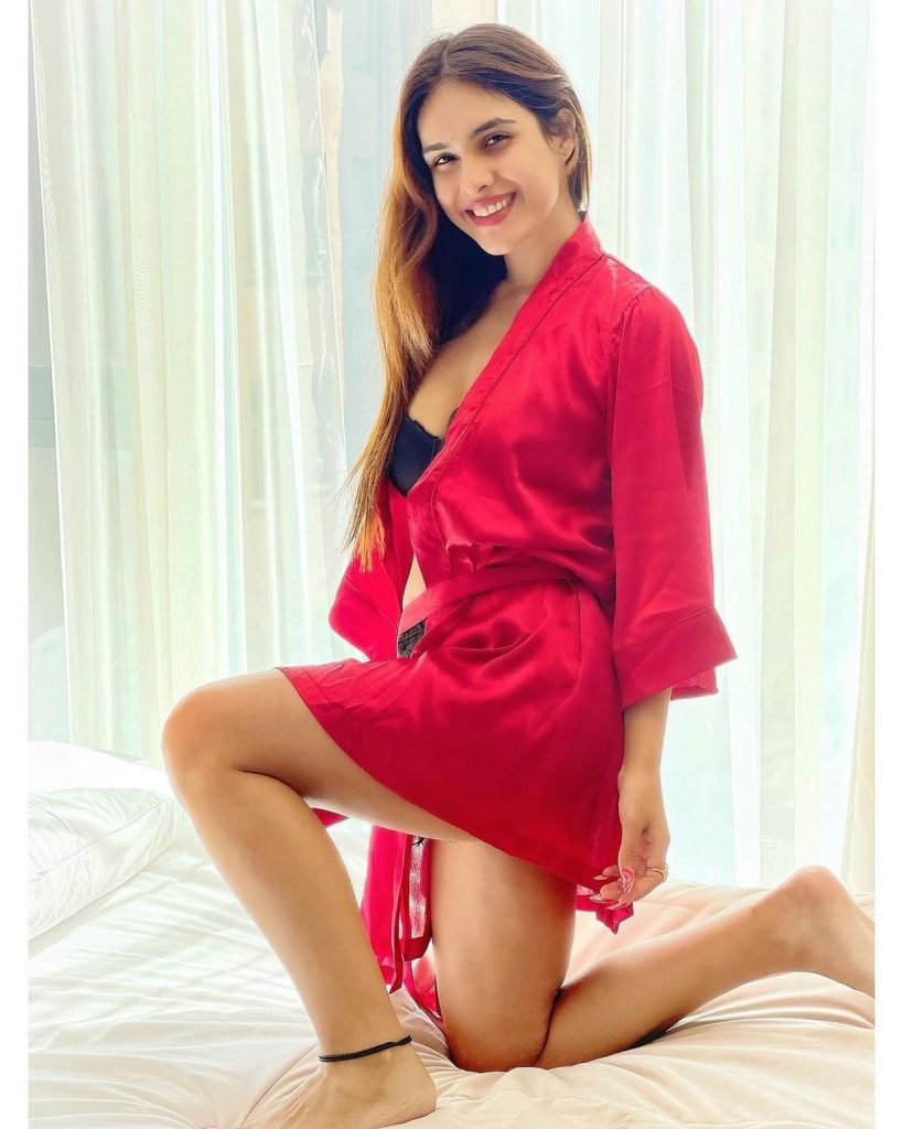 Actress Pics: Neha Malik Unique Styling Of Denim Shorts With A Satin Robe