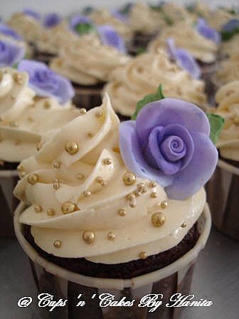 white and purple wedding cupcakes