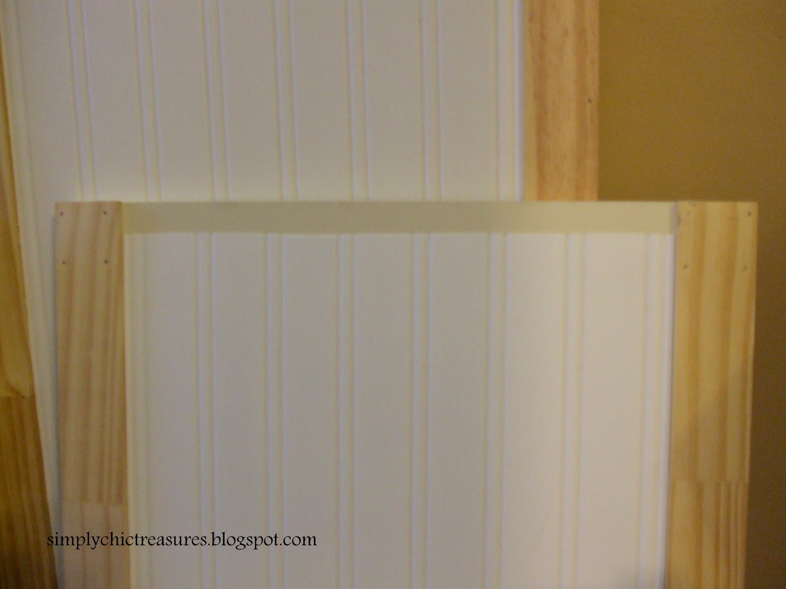 ... to hold it in place. The next step was for me to apply the wallpaper
