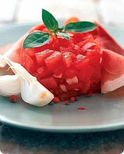 Timballo di pomodori con cipollotto e prosciutto