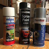Primer, black undercoat, metallic silver topcoat