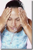 woman washing face