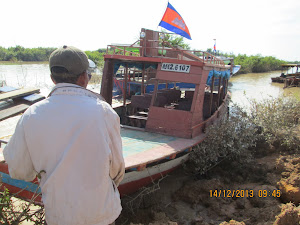 Our Motorboat in the narrow creek