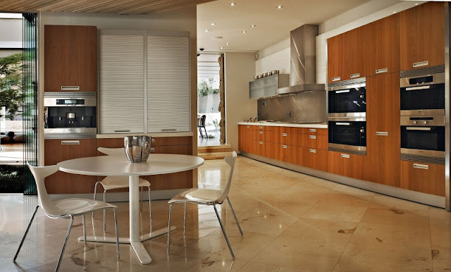 Photo of huge kitchen with small round dinning table