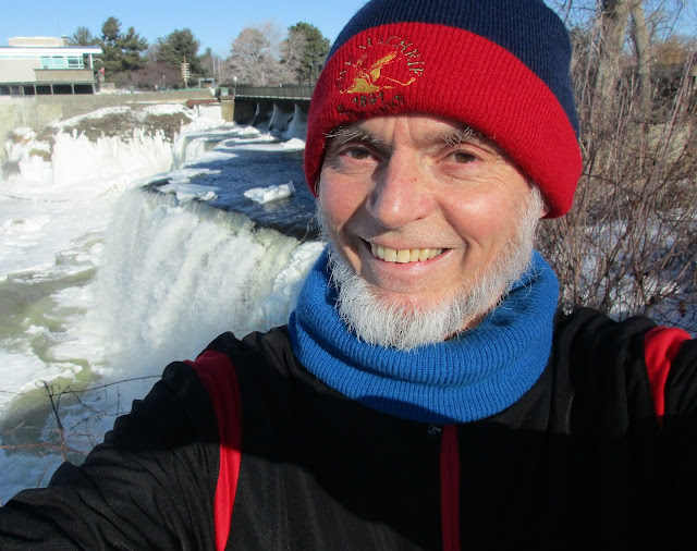 David Rain, Composer and tenor, poses with his Muse - the Rideau Falls, Ottawa, Canada