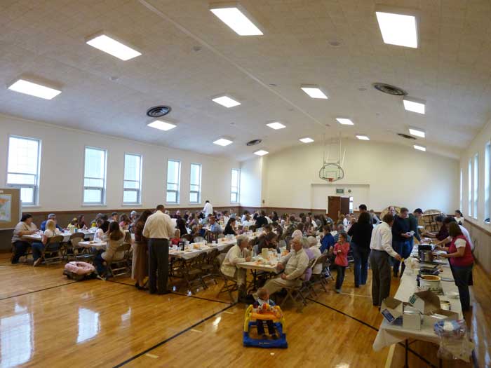 They fill the whole cultural hall as they gather to eat looks like a ward