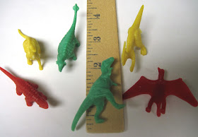 Plastic dinosaurs packed in Operation Christmas Child shoeboxes.