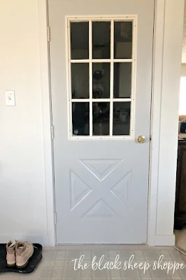 Subtle gray paint freshens up the door.