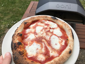 Delicious pizza from the Ooni Koda pizza oven outdoors