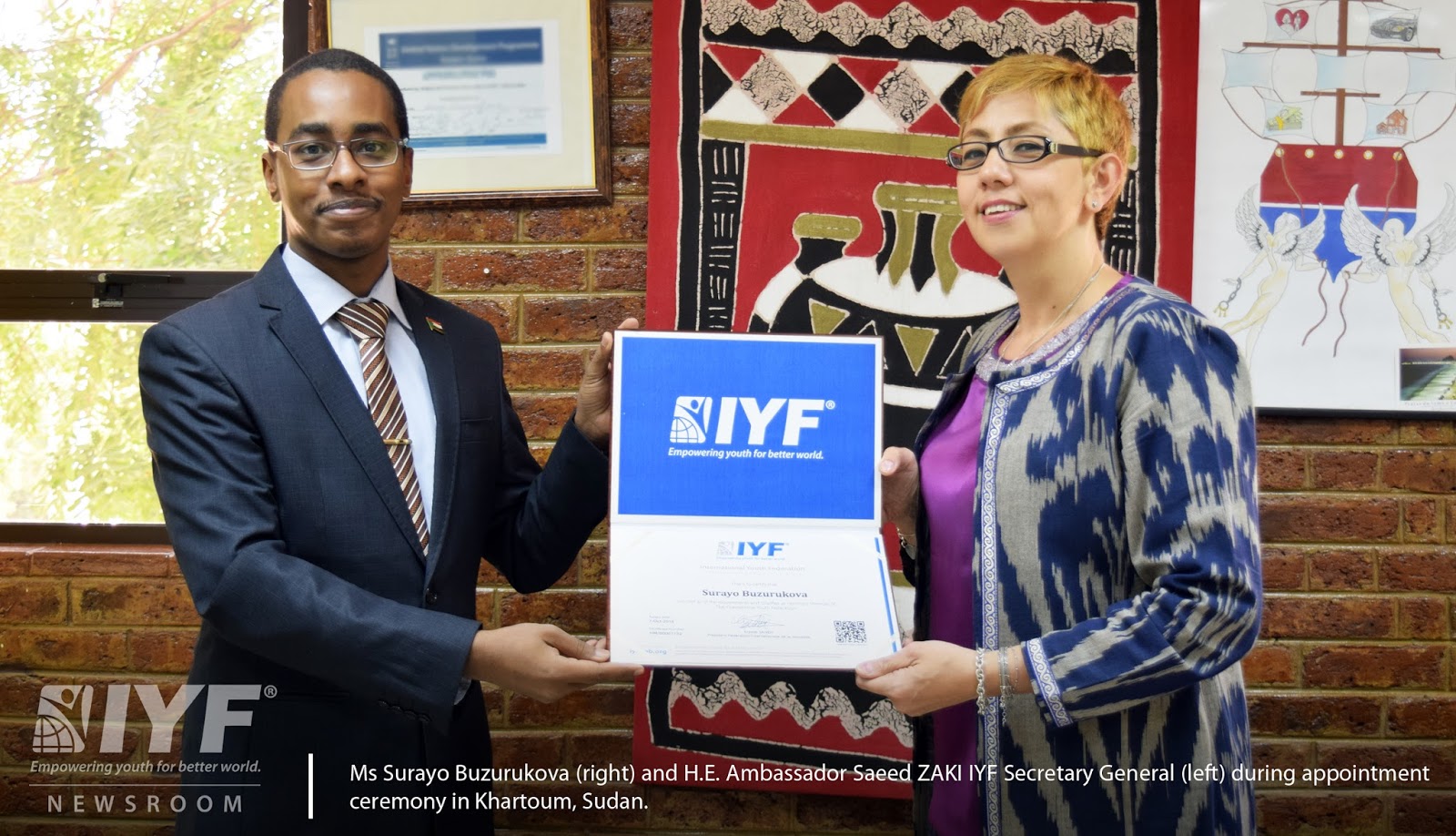 Ms Surayo Buzurukova (right) and H.E. Ambassador Saeed ZAKI IYF Secretary General (left) during appointment ceremony in Khartoum, Sudan.