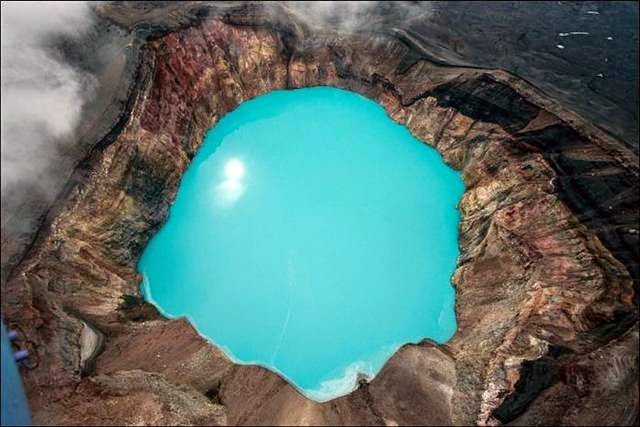 The lake contains a acid crater Small Semyachik Kamchatka